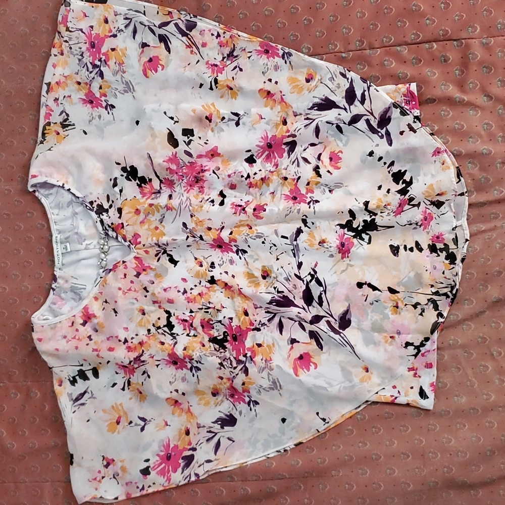A white top with flowers